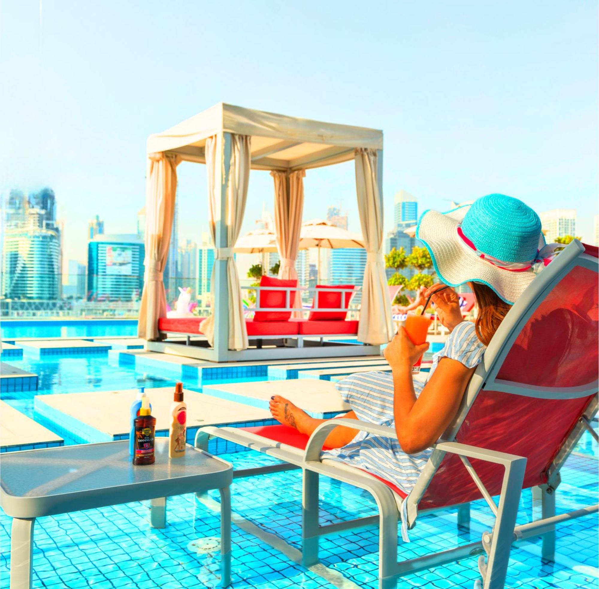 Canal Central Hotel Business Bay Dubai Exterior photo A woman sunbathing